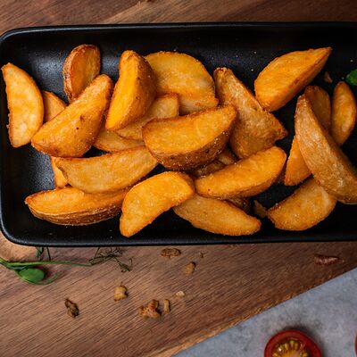 Картофель по-деревенски в Много мяса по цене 299 ₽