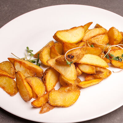 Картофель по-деревенски в Марк Твен по цене 160 ₽