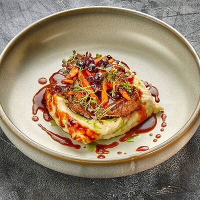 Медальоны из говядины в Пармезан по цене 1445 ₽