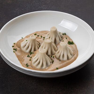 Мини-хинкали из говядины с перечным соусом в Shemodi Шемоди по цене 590 ₽