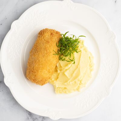 Сочная котлета по-Киевски с картофельным пюре в Патис по цене 736 ₽