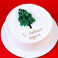 Торт на Новый год белый с елкой и золотой надписьюв Miracle bakery