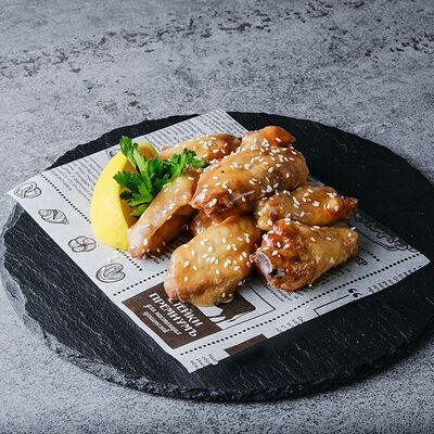 Куриные крылья в кисло-сладком соусе в THE BOX по цене 290