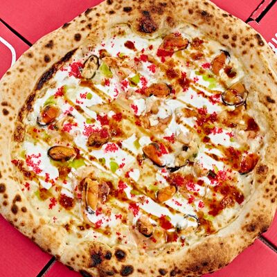 Пицца с морепродуктами в Итальянцы по цене 590 ₽