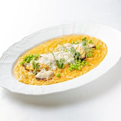 Орзо с мидиями и зеленым горошкомв Dodici Seafood по цене 910 ₽