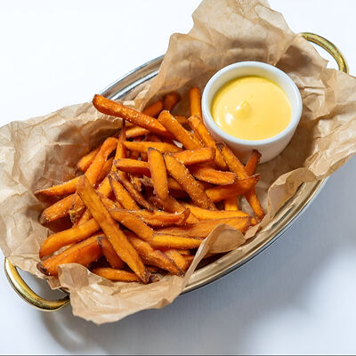 Батат фри с сырным соусом в Бистро Рыба Мечты по цене 490 ₽