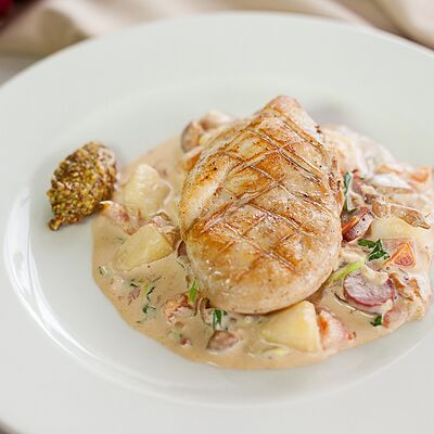 Филе куриное с картофелем и томатами в Рандеву по цене 590 ₽