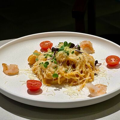 Спагетти с креветками в соусе том ям в Долина Кофе по цене 635 ₽