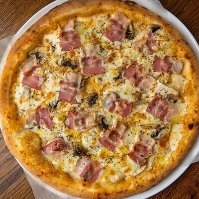 Пицца Не острая Цыпа в Кафе Цоколь по цене 690 ₽