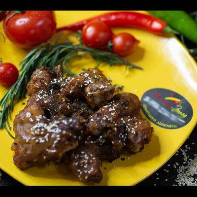 Крылья куриные в кисло-сладком соусе в Восток запад по цене 580 ₽