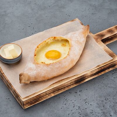 Хачапури по-аджарскив Осетинские пироги от Бирюзы по цене 610 ₽