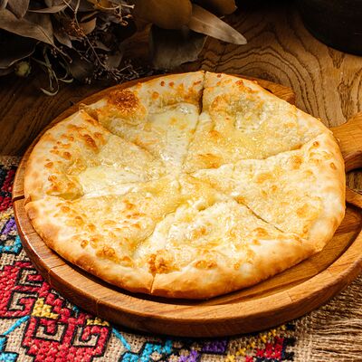 Хачапури по-мегрельски в Хачапури и Вино по цене 803 ₽