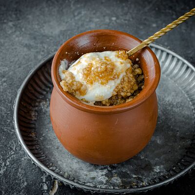 Мацони с медом, чиа, грецкими орехами в Кафе Хинкальная на Крылатской по цене 403 ₽