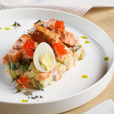 Салат Оливье с копченым лососем в Компот по цене 520 ₽