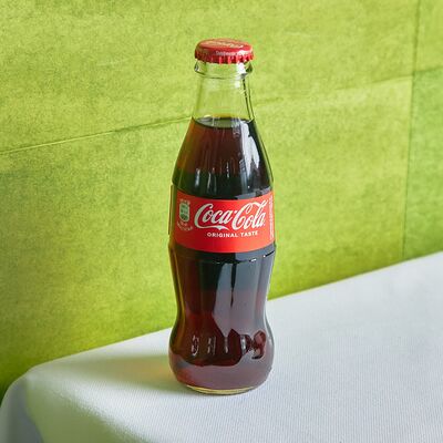 Coca-Cola в Mio Bistrot по цене 390 ₽