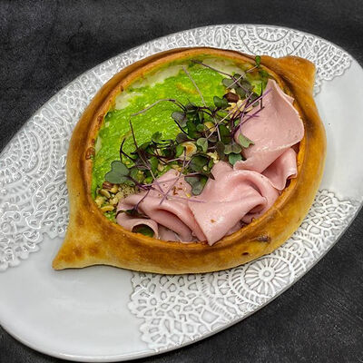 Хачапури по-аджарски с мортаделлой и орехами в Бумбараш по цене 620 ₽