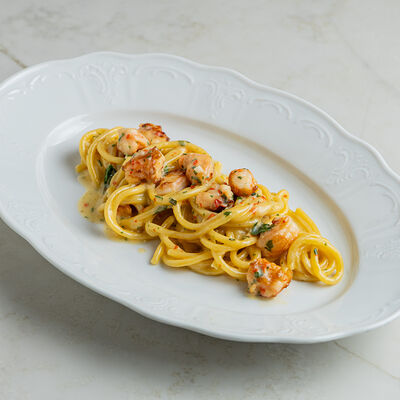 Спагетти алио-олио с креветками в Nomad по цене 1190 ₽