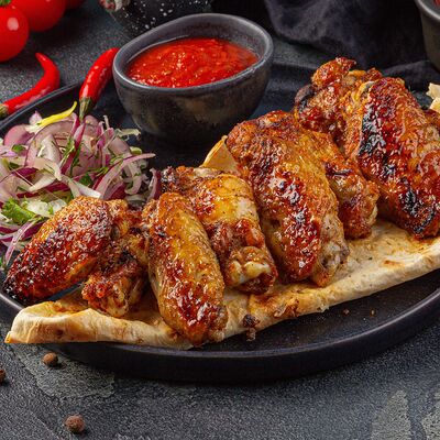 Куриные крылышки в Армянская шашлычная по цене 650 ₽