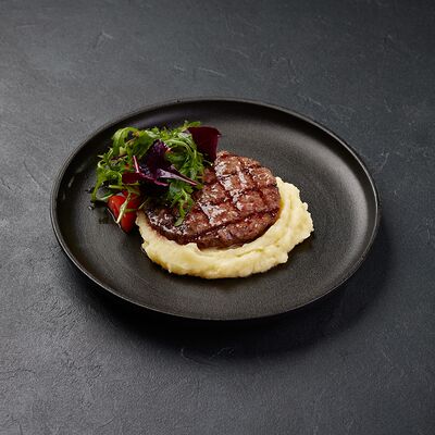 Бифштекс из мраморного мяса в По Чесноку по цене 828 ₽