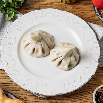 Хинкали чкмерули вареные в Ресторан-сыроварня Брынза по цене 190 ₽