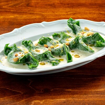 Равиоли с мортаделлой и кедровыми орешками в Tre Santi по цене 1170 ₽