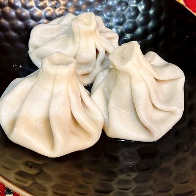 Хинкали вареные с говядиной и свининой в Мимино по цене 480 ₽