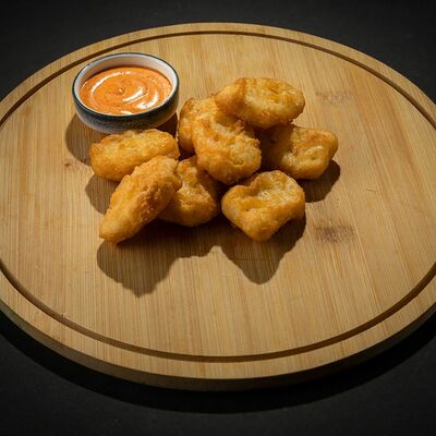 Куриные наггетсы в Wasabi по цене 270 ₽