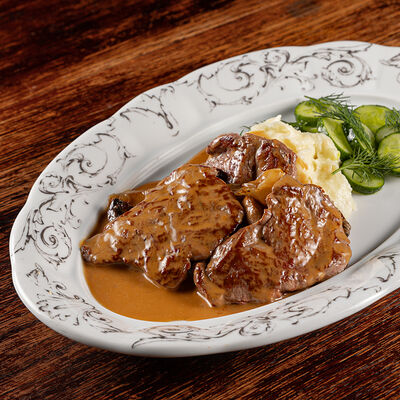 Стейк Строганов с запеченными грибами в Blackchops по цене 1990 ₽