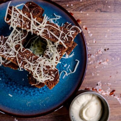 Гренки с трюфельным маслом и пармезаном в Urban по цене 290 ₽