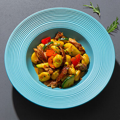 Ньокки с перечной свининой и овощами в Yami Yami по цене 800 ₽