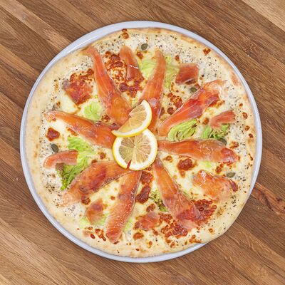 Пицца с лососемв 30 см по цене 1100 ₽