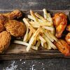 Куриные крылья, и ножки и фрив Gi Gi Pizza по цене 999