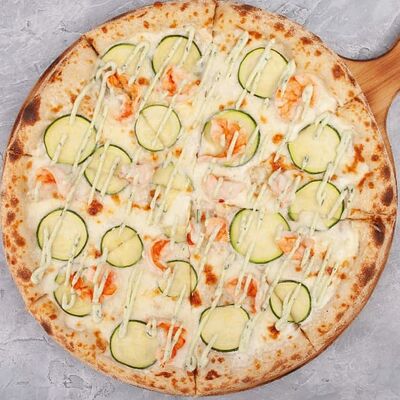 Пицца с Креветкой и цукини и трюфельным маслом в Наше место по цене 1250 ₽