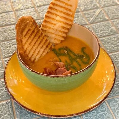 Крем-суп тыквенный с беконом в Iris по цене 390 ₽