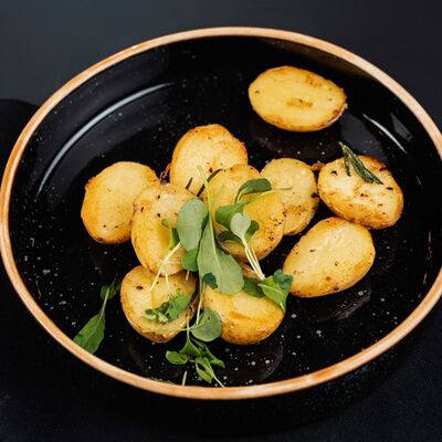 Молодой картофель с розмарином в РАХАТ по цене 205 ₽