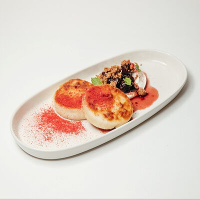 Фирменные сырники в Сны любимого кота по цене 430 ₽