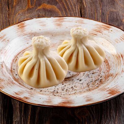 Хинкали с сыромв У Ханумы по цене 200 ₽