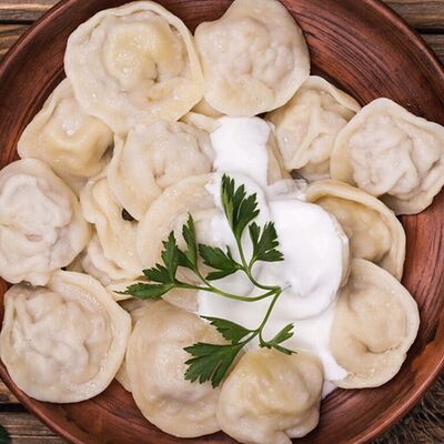 Домашние пельмени со сметаной в Панорама по цене 480 ₽