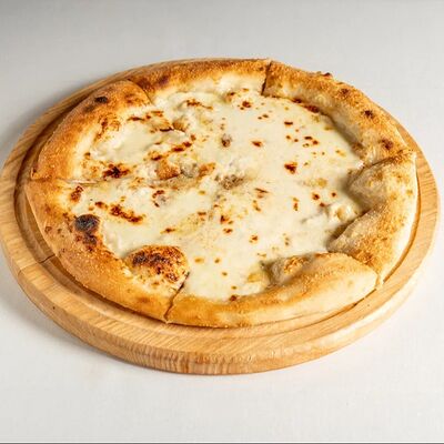 Пицца Четыре сыра в ROMO по цене 1380 ₽