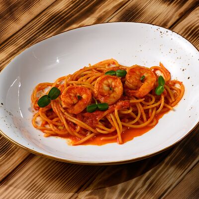 Паста арабиата с креветками в Ресторан Мангал по цене 730 ₽