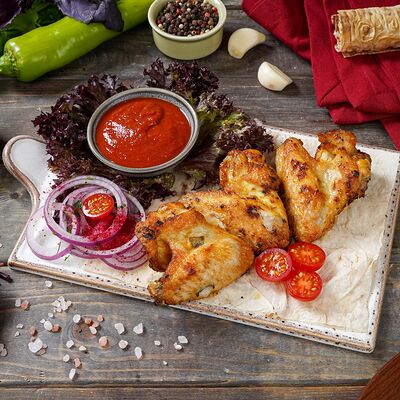 Шашлык из куриных крыльев в Лаваш по цене 850 ₽