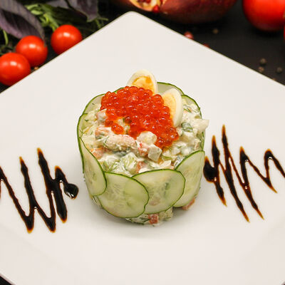 Салат Оливье с раковыми шейками в Кафе Хинкальная по цене 440 ₽