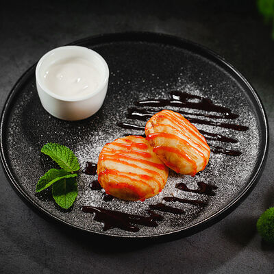 Сырники со сметаной в Inyan по цене 363 ₽