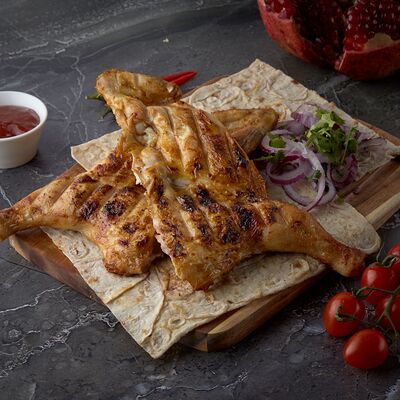 Цыпленок табака в Горячий мангал по цене 749 ₽