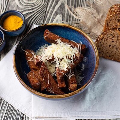 Гренки с чесноком и пармезаном в Линдфорс по цене 405 ₽