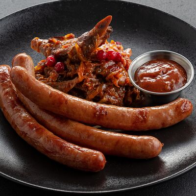 Егерские колбаски с тушеной капустой в Jager restopub по цене 880 ₽