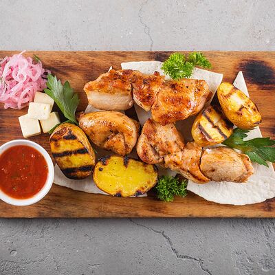 Шашлык из курицы в Мангал по цене 530 ₽