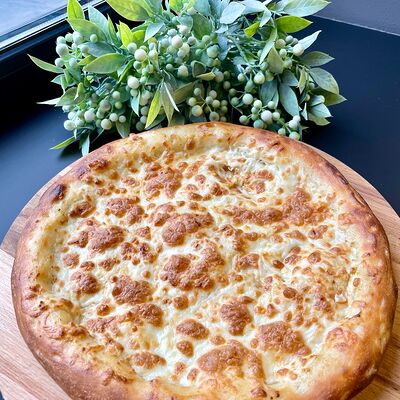 Сырная лепешка 26 см в Caramel по цене 485 ₽