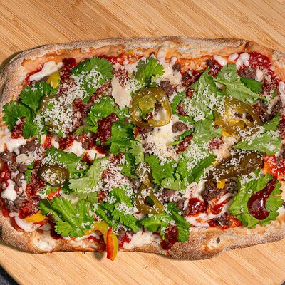 Пицца Манзо Кориандо (с остринкой) в 4 СЫРА по цене 980 ₽