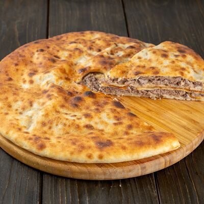 Осетинский пирог с острым мясом в Осетинские пироги Вкусно Пироги по цене 1100